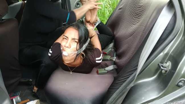 Jogger-Bound-And-Gagged-In-Backseat-Of-Car-6