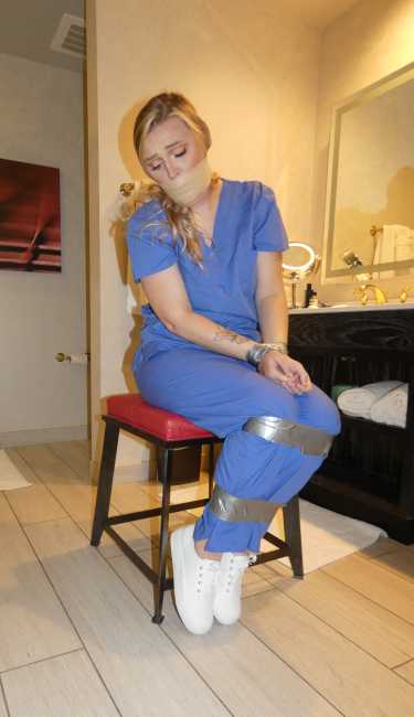 Kidnapped-Nurse-Tape-Bound-And-Bandage-Wrap-Gagged-1