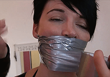 Ladies-Bound-And-Gagged-By-Catsuit-Woman-17