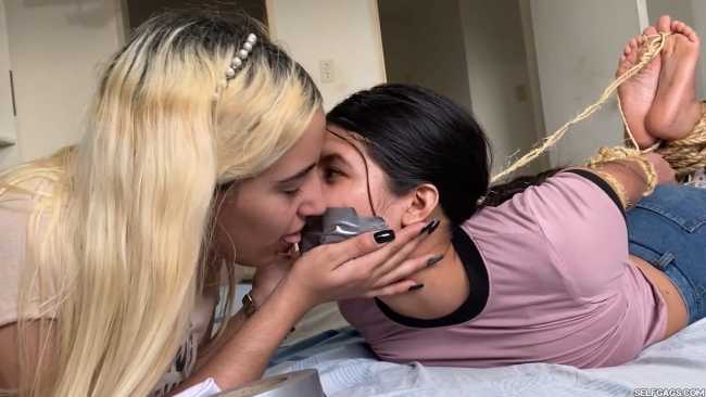 Lesbian-Bondage-Girl-Gagged-And-Hogtied-By-New-Neighbor-23