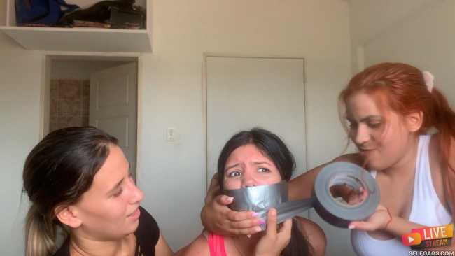 Gagged webcam girls in tape bondage