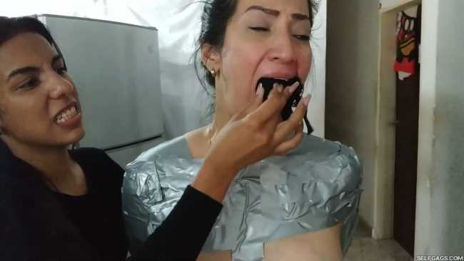 Latina MILF duct tape mummified by lesbian girls