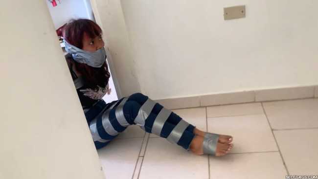 Naughty-Backtalking-Teenage-Girl-Gagged-In-Tight-Tape-Bondage-By-Her-Evil-Stepmom-14