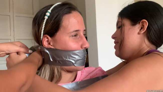Sexy girl does duct tape bondage escape challenge