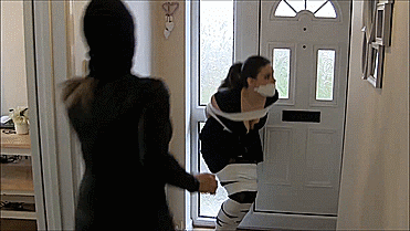 Snooping-Reporter-Bound-And-Gagged-By-Catsuit-Women-9