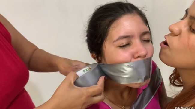 Fighting girls bound and gagged