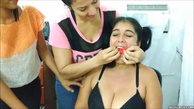 Latina woman turned gagged slut by three lesbian women