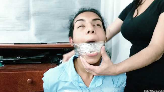 Tape-Selling-Schoolgirls-Ruthlessly-Wrap-Gagged-4