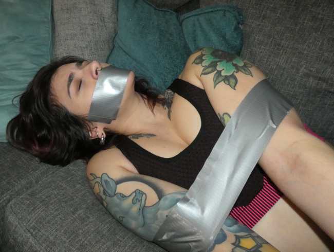 Tattooed-woman-in-tape-bondage-3