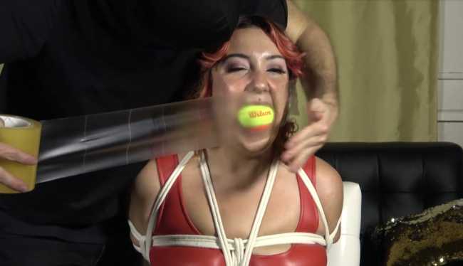 Tennis-Ball-Gagged-With-Transparent-Tape-Gag