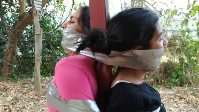 Tresspassing-Girls-Bound-And-Gagged-Outside-8
