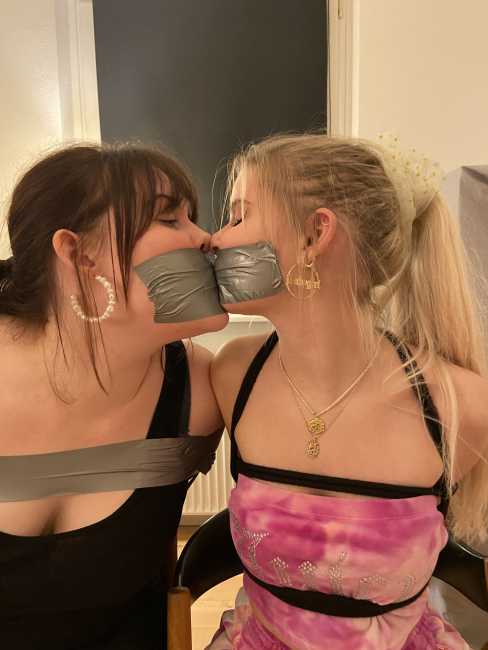 Two-Girls-Tied-Up-And-Tapegagged-6