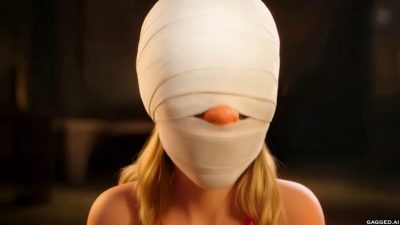 Full white bandage mummy head wrap covering Olivia’s eyes and mouth (nose tip only)