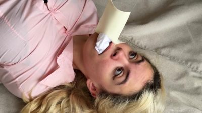 Microfoam tape mid-seal pulling tight over the stuffed sock gag